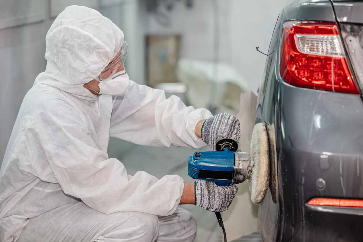 Garage car color repair wax coat and glossy polishing team staff